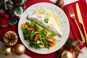 piatto di pesce tovaglia rossa acquisto pesce per natale